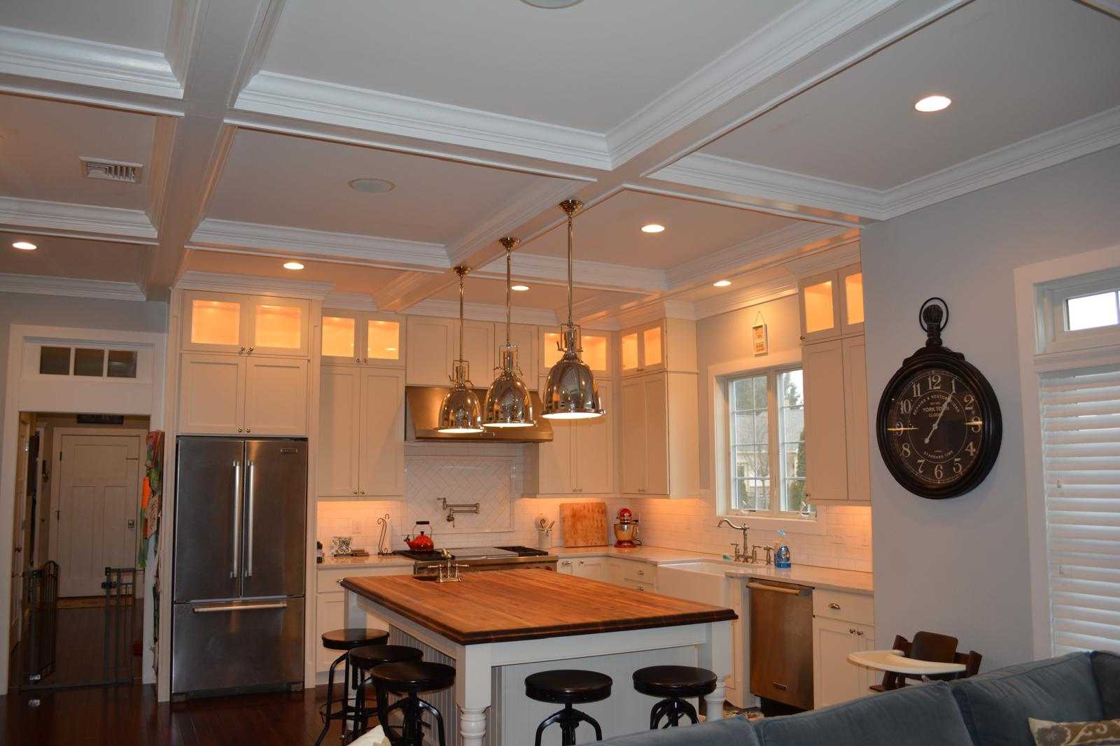 Modern interior with custom wooden furniture and drywall accents