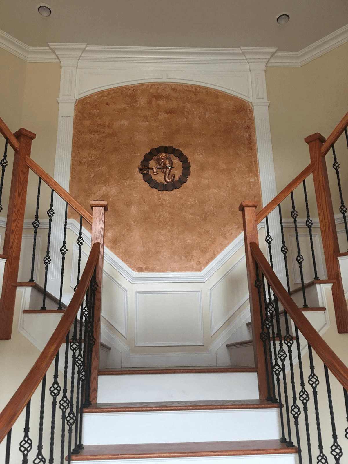 Detailed carpentry work featuring custom wooden trim and molding